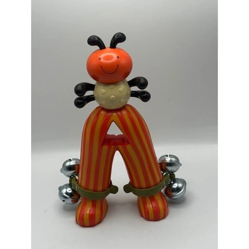 Cheerful Ladybug Toy with Jingle Bells and Striped Legs